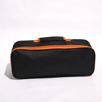 Black zippered storage bag with orange trim for lockout kit